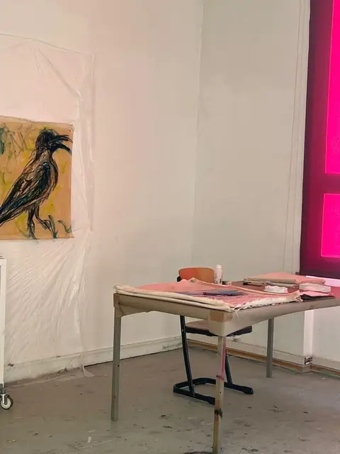 A crow drawing beside the work table