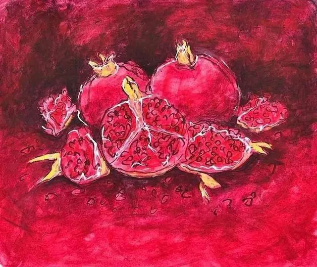 Pomegranates on deep red