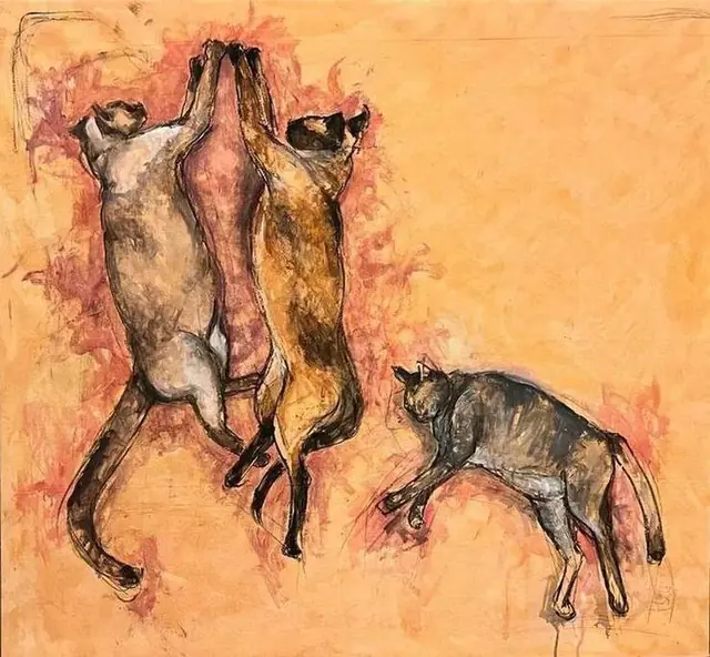 Three cats on an orange ground