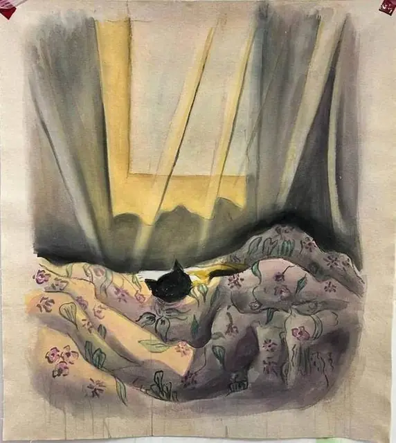A cat in floral sheets by the window