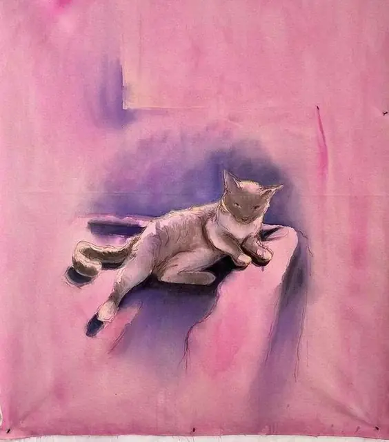 A cat resting on violet