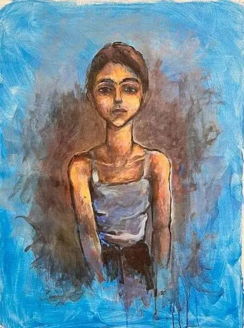 A young woman on blue