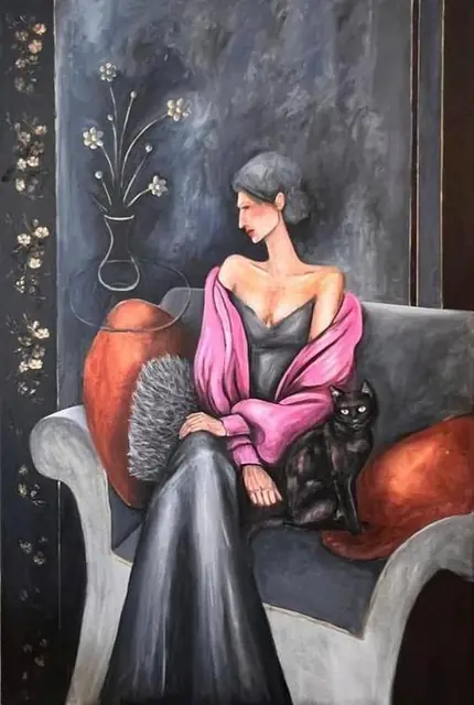 A woman on a sofa with a black cat