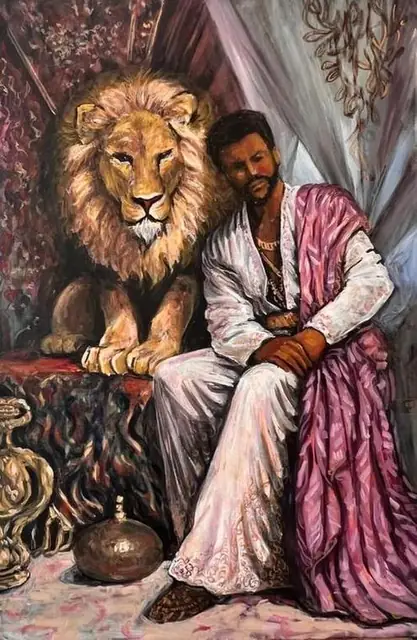 A man in white with a lion