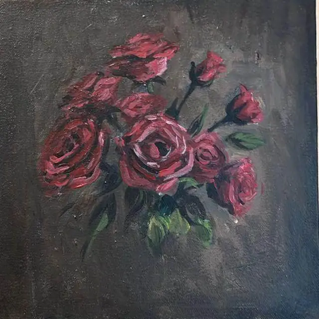 Red roses on dark grey