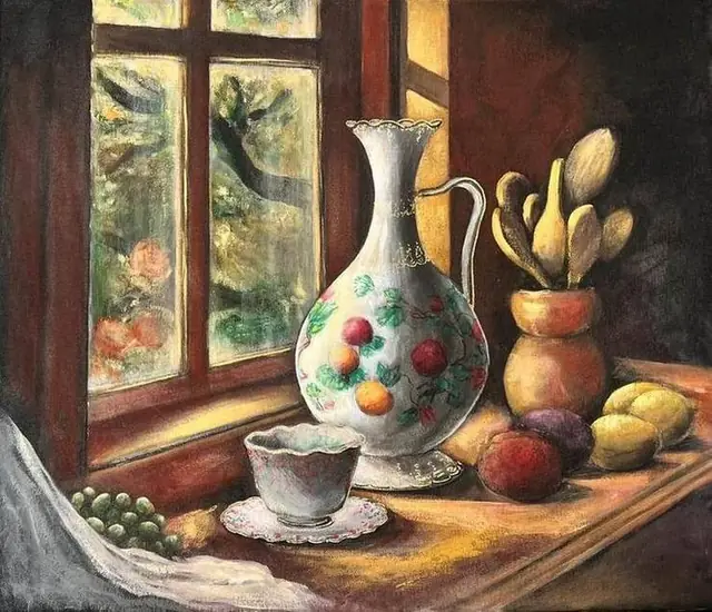 A porcelain jug and cup by a sunlit window