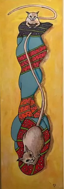 Two cats on a patterned scroll, on yellow