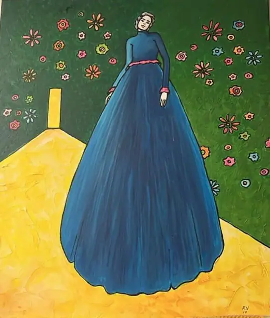 A woman in a blue gown, on green