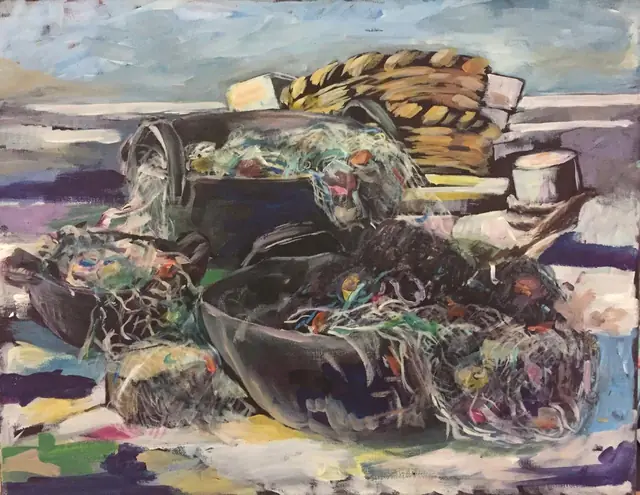 Fishing nets and baskets on the shore