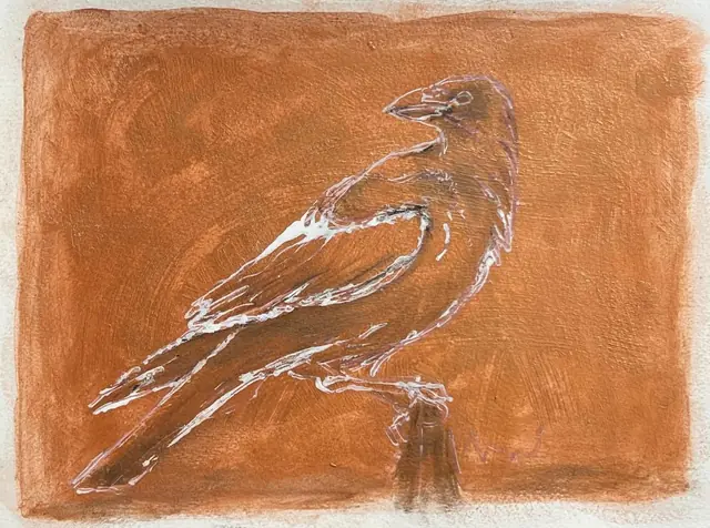 A crow drawn in white line, on burnt orange