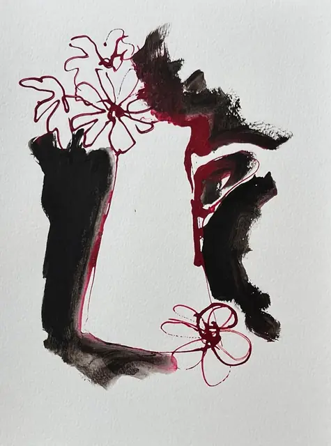 Crimson line flowers and drips on a black vase