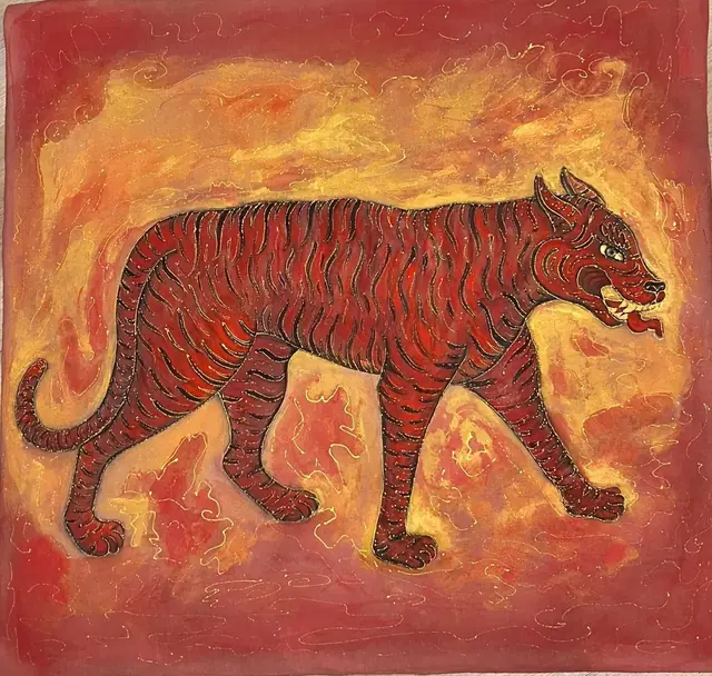 A red tiger striding through gold and flame
