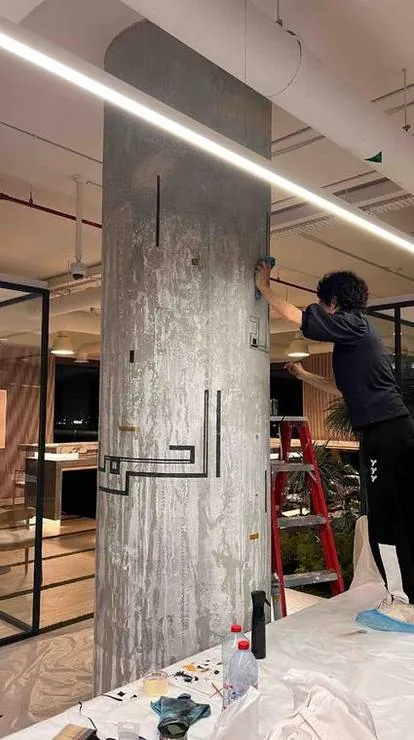 Painting on site, in the middle of the office