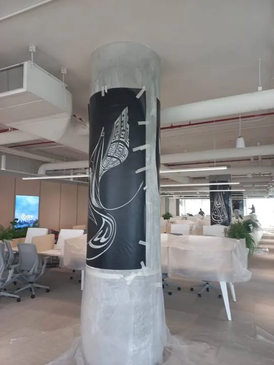A calligraphy stencil wrapped around a column