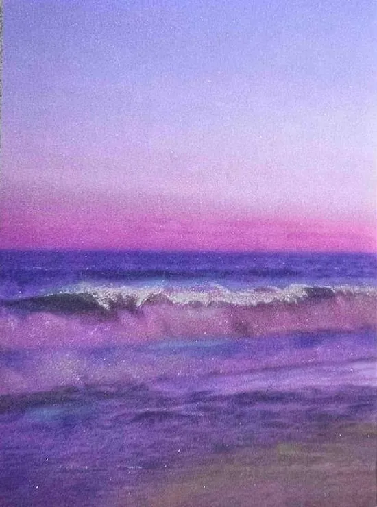 Violet sea under a pink sky