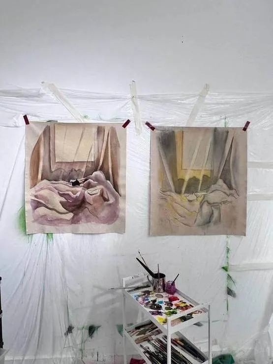 Two bed paintings on the studio wall