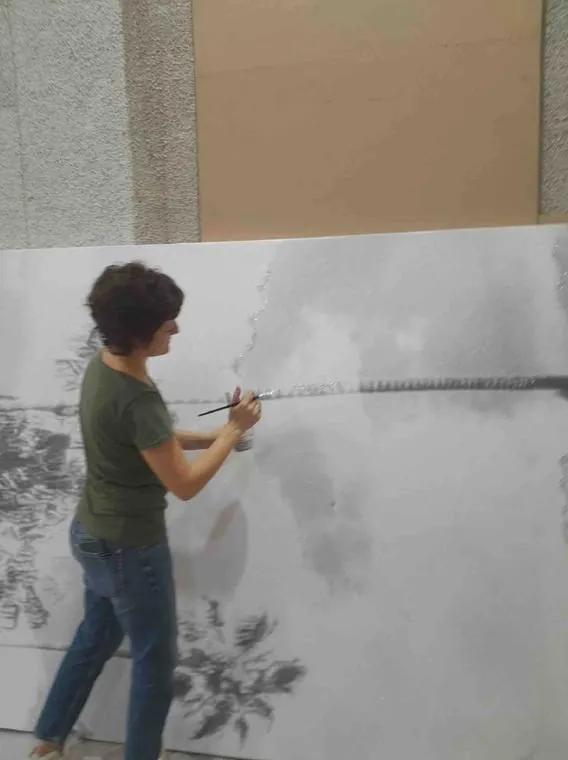 Applying glitter to the backdrop panel